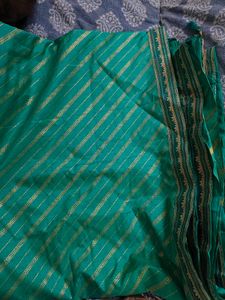 Elegant Teal Saree with Gold Border