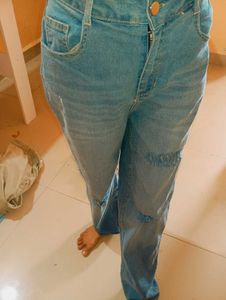 Distressed Blue Denim Jeans