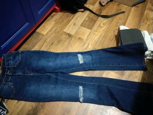 Flared Jeans with Ripped Knees