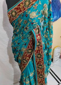 Exquisite Teal hand work heavy saree 🔥