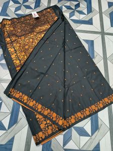 Elegant Black Saree with copper zariFloral Border