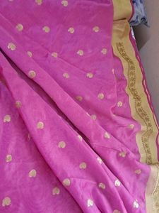 Elegant Pink Saree with Golden Motifs