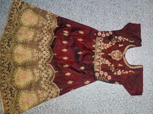 Embroidered Maroon Lehenga Choli with Pink Dupatta