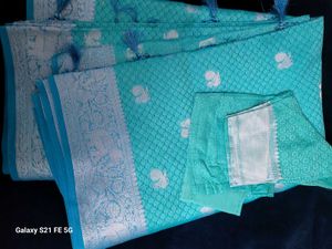 Elegant Teal Saree with Silver Weave