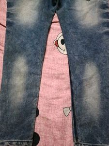 Distressed Blue Denim Jeans