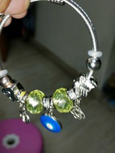 Charming Charm Bracelet with Yellow Beads