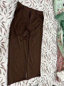 Chic Brown Wide-Leg Pants and tank top from Savana