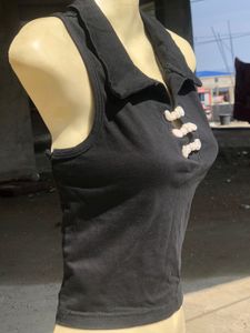 Elegant Black Blouse with White Trim