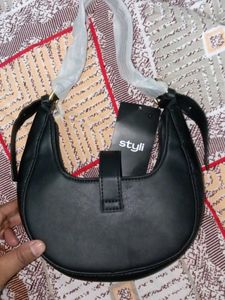 Chic Black Hobo Bag with Gold Accent