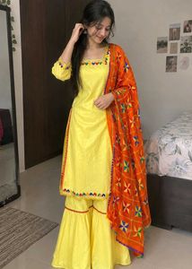 Vibrant Yellow Kurta with Colorful Tassels