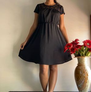 Elegant Black Dress with Lace Detail