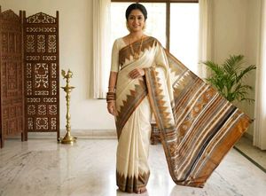 Elegant Cream Saree with Brown Border
