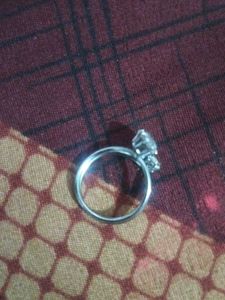 Elegant Solitaire Ring with Accent Stones