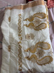 Elegant White Saree with Golden Border