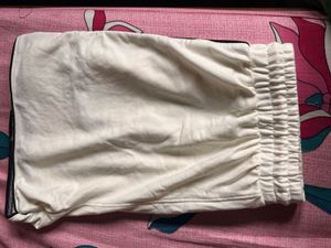 Cream Sweatshorts with Black Piping