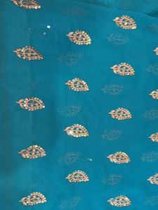 Beautiful Teal Saree with Embellishments