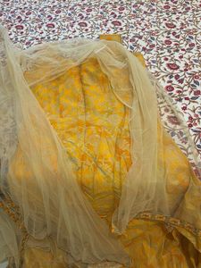 Ethnic yellow gown with shrug and dupatta