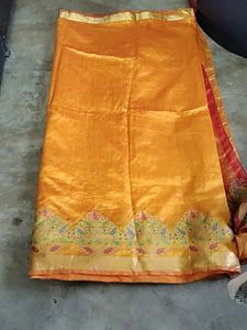 Elegant Orange Silk Saree with Floral Border