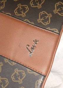 Lavie Brown Monogram Crossbody bag👜
