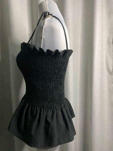 Chic Black Smocked Peplum Top