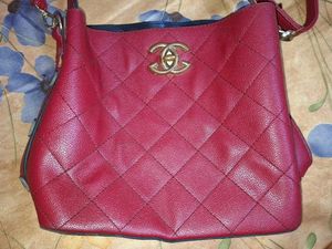 The red quilted hobo handbag