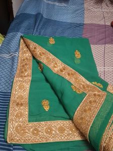 Elegant Green Saree with Gold Embroidery