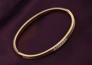 Elegant Gold Bangle with Crystals