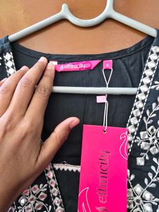 Elegant Dark Kurta with Intricate Neckline
