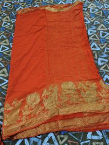 Vibrant Orange Saree with Gold Border