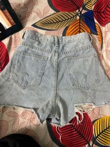 Distressed Light Wash Denim Shorts