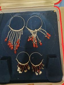 combo of 3- hand jewelry, hoops, 2 hair cli