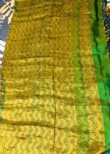 Elegant Teal Saree with Embellished Detailing