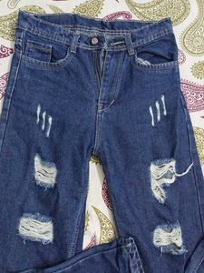 Distressed Blue Denim Jeans