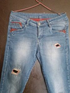 Ripped Knee Denim Jeans