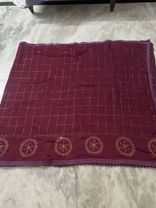 Beautiful embroidery and Zari checked Saree
