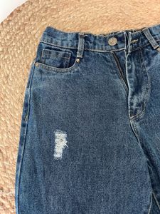 Distressed Blue Denim Jeans