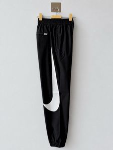 Nike Black Swoosh Track Pants
