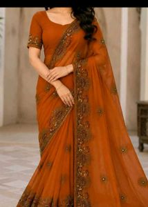 Elegant rust brownish touch saree
