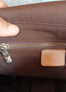 LV sling bag in mint condition, without code.