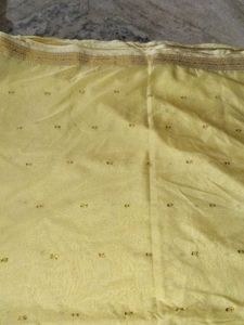 Elegant Yellow Saree with Embellishments