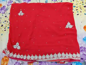 Stunning Reddish Pink Embellished Saree