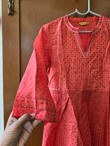 Elegant Coral Kurta with Intricate Print