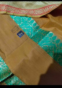 Vibrant Orange Saree with Green Border