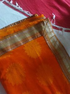 Orange Saree with Floral Motifs
