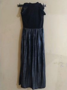 Party Wear Gown Of' S' Size Available.... Basically It's Neck Is Halter Neck ....If Any One Don't Want Sleeves Can Remove It ...On Removal It Looks Like Halter Neck ....