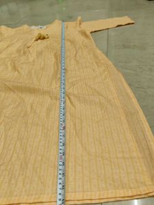 Elegant Yellow Striped Kurta with Tassel Detail