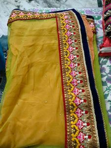 net embroidery saree with velvet blouse