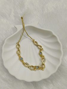 Sparkling Infinity Bracelet - Gold Tone