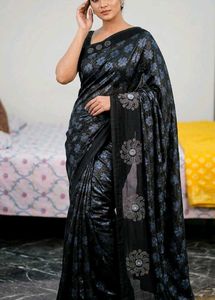Elegant Black Saree with Blue Floral Print