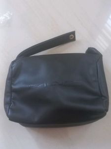 Black MAC Bag and cleansing oil